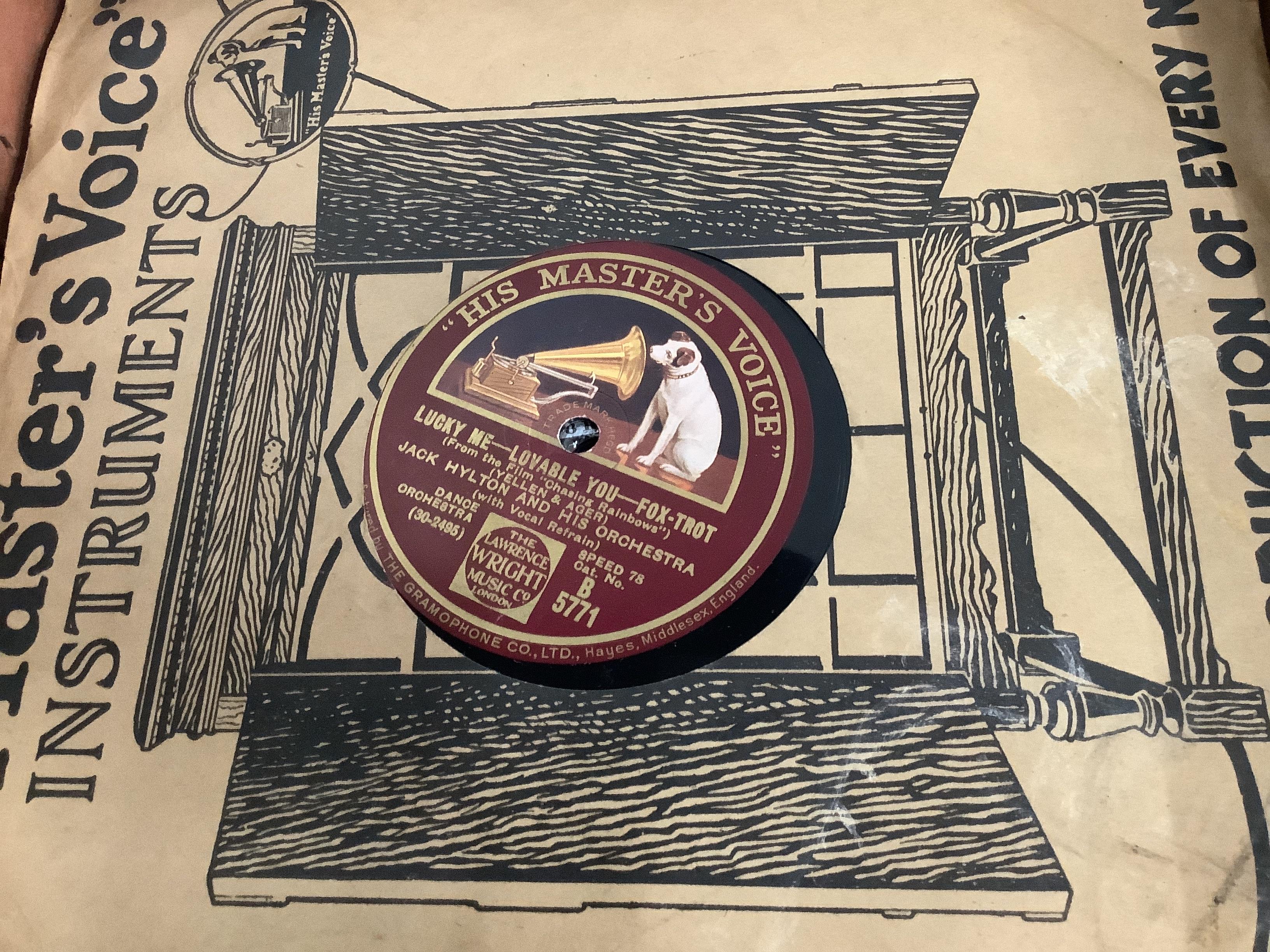 An early 20th century oak cased wind-up gramophone 'The Minstrel', width 74cm, depth 46cm, height 82cm, together with a small quantity of 78 rpm records